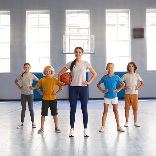 A group of students playing basketball